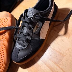 Puma Black and Cream Sneakers with Orange Soles